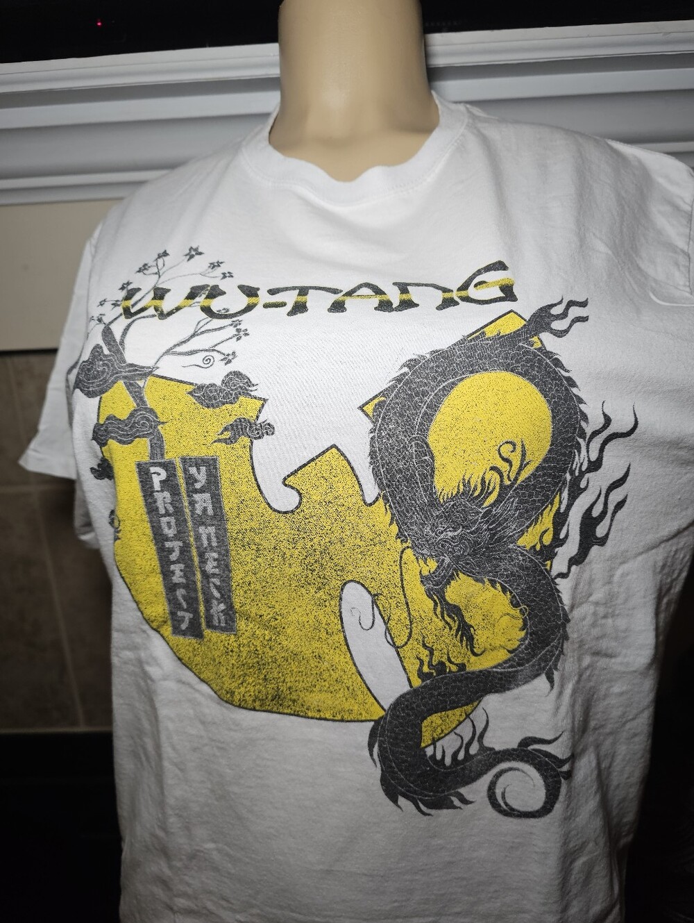 Vintage Wu Tang Protect Ya Neck T-shirt.